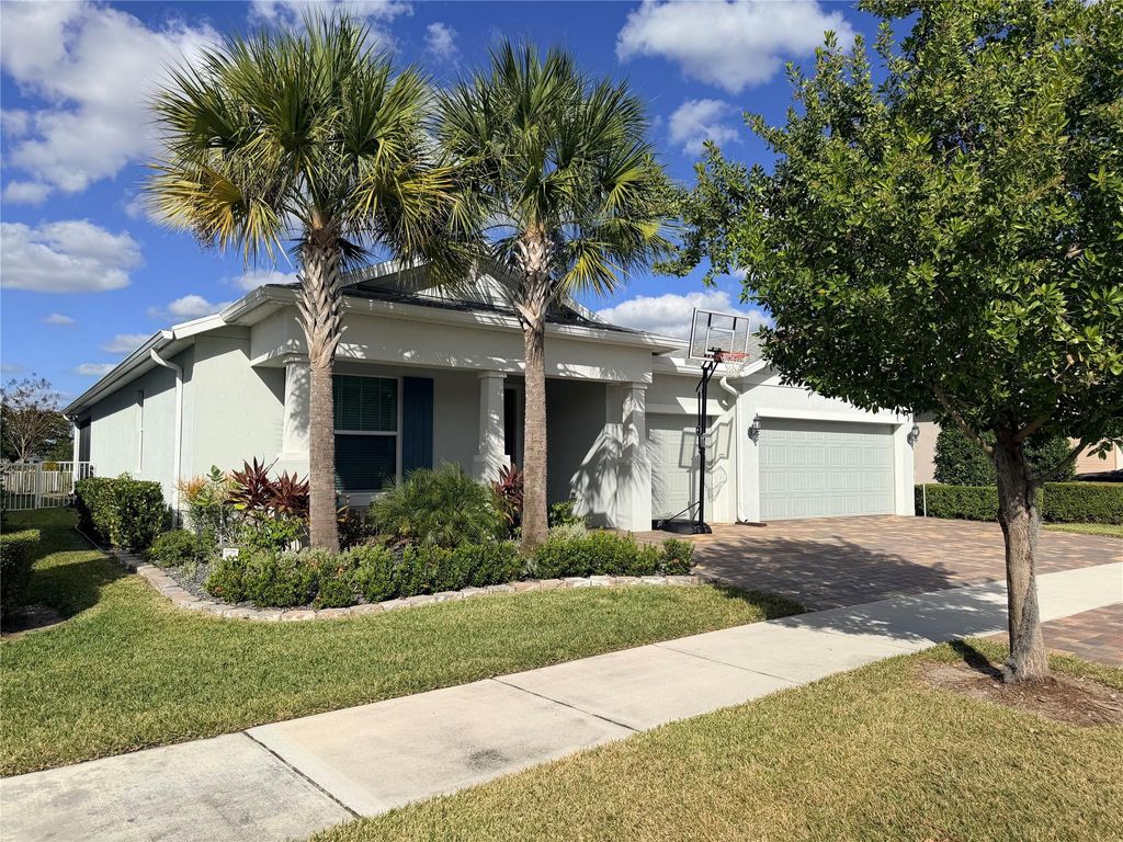 Photo of 10497 SW Captiva Drive, Port Saint Lucie, FL 34987 (MLS # F10537125)