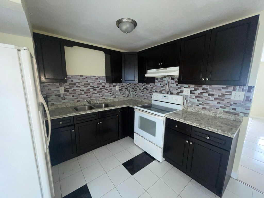 Photo of 5320 Harriet Place, West Palm Beach, FL 33407 (MLS # R11164052)