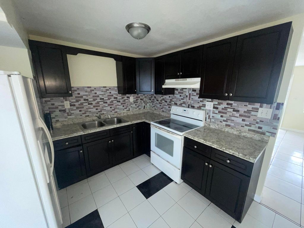Photo of 5320 Harriet Place, West Palm Beach, FL 33407 (MLS # R11164052)