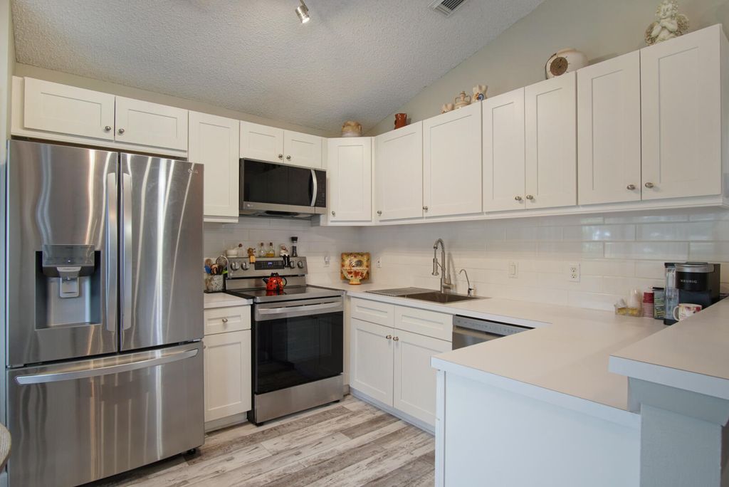 Photo of 683 NW San Remo Circle, Port Saint Lucie, FL 34986 (MLS # R11118370)