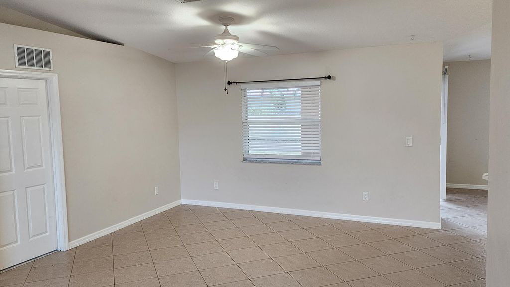Photo of 4220 SW Jarmer Road, Port Saint Lucie, FL 34953 (MLS # B26007937)