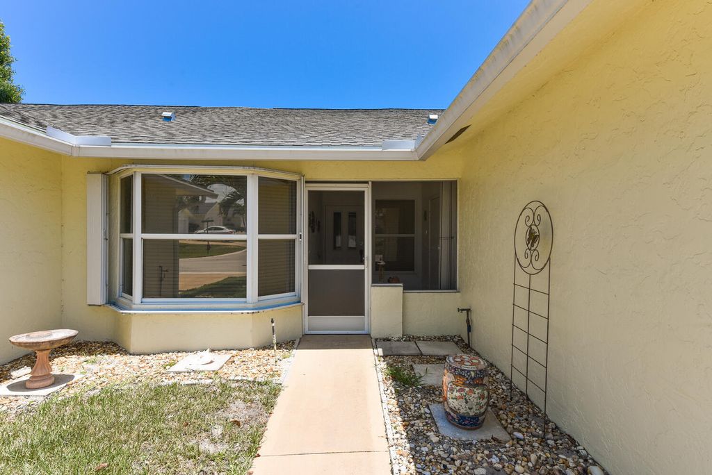 Photo of 11109 SE Sea Pines Circle, Hobe Sound, FL 33455 (MLS # R10991074)