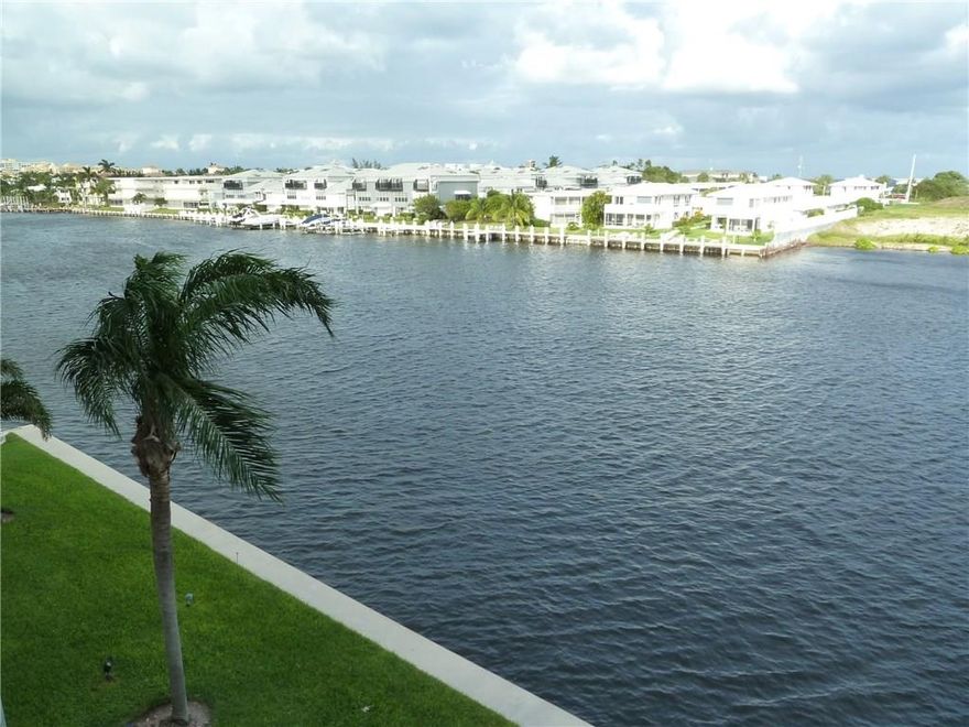Rare find! Direct intracoastal views from every room!  Let the sun shine in with gorgeous morning sunrises. Impact sliders in master bedroom lead to balcony directly on the intracoastal! Wood floors in master bedroom & living room. Kitchen has a great marina view! Bay windows in living room. Real wood floors!  Two community pools, & FREE boat dock when available. Two pools-one chilled; one heated. Gas grills, FREE boat dockage when available & a private gate to a great park with walk/jog trails & fishing.