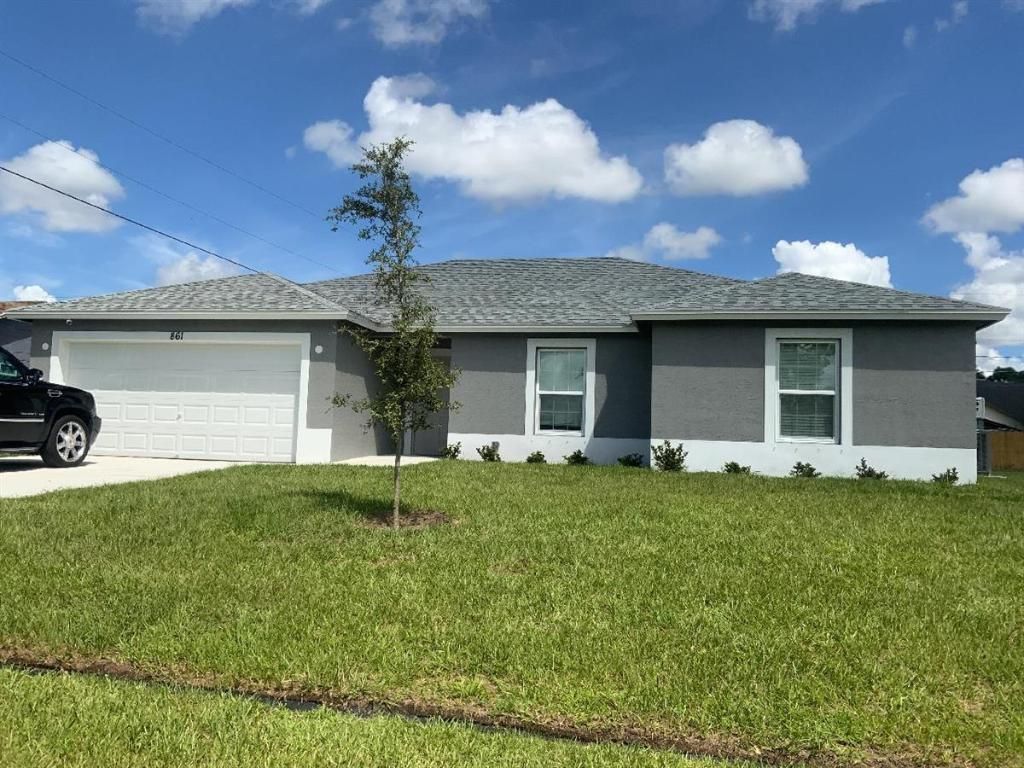 Photo of 861 SW Thrift Avenue, Port Saint Lucie, FL 34953 (MLS # R10904948)