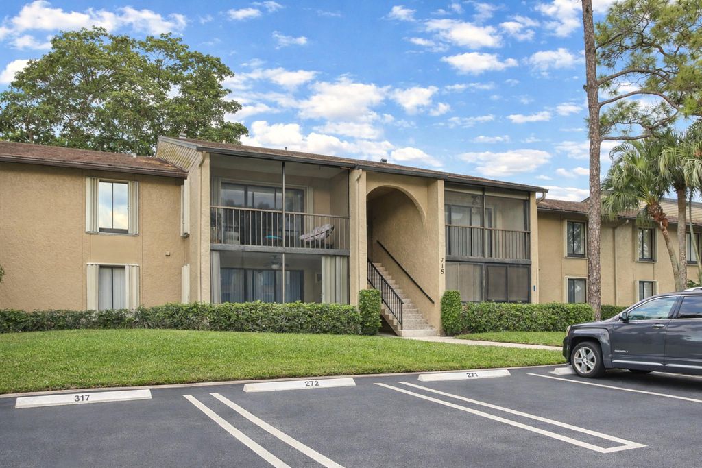 Photo of 715 Sunny Pine Way #A2, Greenacres, FL 33415 (MLS # R11137413)