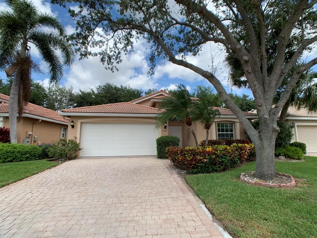 Photo of 6967 Viale Elizabeth, Delray Beach, FL 33446 (MLS # R10877144)