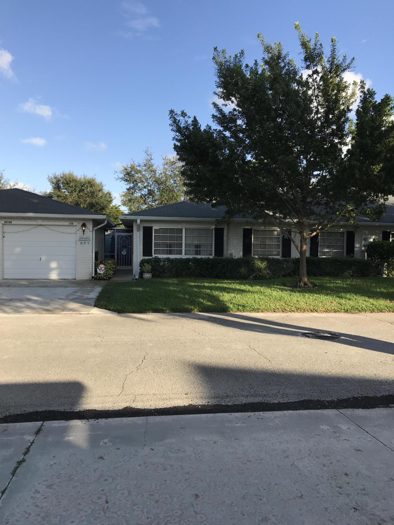 MAN GATE/GARAGE/SMALL PET WELCOME! EVERYTHING REDONE LESS THAN 3 YEARS AGO - NEW A/C, NEW KITCHEN, NEW MASTER BATH, NEW GUEST BATH, NEW APPLIANCES - JUST MOVE IN! LIMETREE HAS LOTS TO OFFER INCLUDING BUT NOT LIMITED TO GATE WHICH IS MANNED 24/7, SMALL PET UNDER 15 LBS ALLOWED, ACTIVITIES GALORE, PARTIES, CONV. LOCATION AND MUCH MORE. THIS UNIT FEATURES A ONE CAR GARAGE WHICH HAS THE FRONT LOAD, LESS THAN 3 YEARS, OLD WASHER AND DRYER. THE WALLED AND SCREENED PATIO IS THE PERFECT PLACE FOR BBQING OR JUST SITTING ENJOYING THE COOL EVENINGS DURING THE SEASON. ENTER INTO A MASSIVE GREAT ROOM/DINING ROOM COMBINATION WHICH CAN EASILY ENTERTAIN LOTS OF PEOPLE. THE UPDATED KITCHEN FEATURES AN OPEN DOORWAY WHICH ALLOWS PLENTY OF NATURAL
