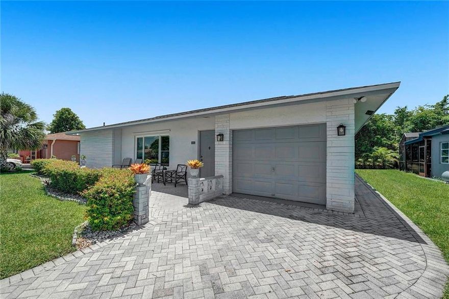 Whether you're downsizing, or moving up to the pride of owning an affordable first home, this two bedroom, two bath Westwood Tamarac property is a great option. The two big headlines here are that this home has a brand new roof - installed in October '21, and impact windows that were installed in May of 2019. The electric panel has been upgraded and replaced, and the water heater is only a few years old. Plenty of room for parking, including a one-car garage, and a decent sized back yard. plus patio for recreational activities. Walking distance from Tamarac's Tephford Park, a passive community park with picnic facilities, walking and exercise paths, a playground, and even a fishing pier, and close (but distant!) from the main roads. Very low monthly HOA fee of just $35!