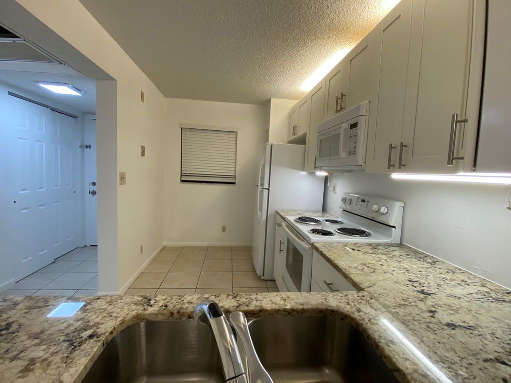 Photo of 9000 NW 28th Drive #1-206, Coral Springs, FL 33065 (MLS # F10429418)