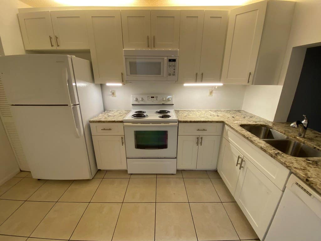 Photo of 9000 NW 28th Drive #1-206, Coral Springs, FL 33065 (MLS # F10429418)