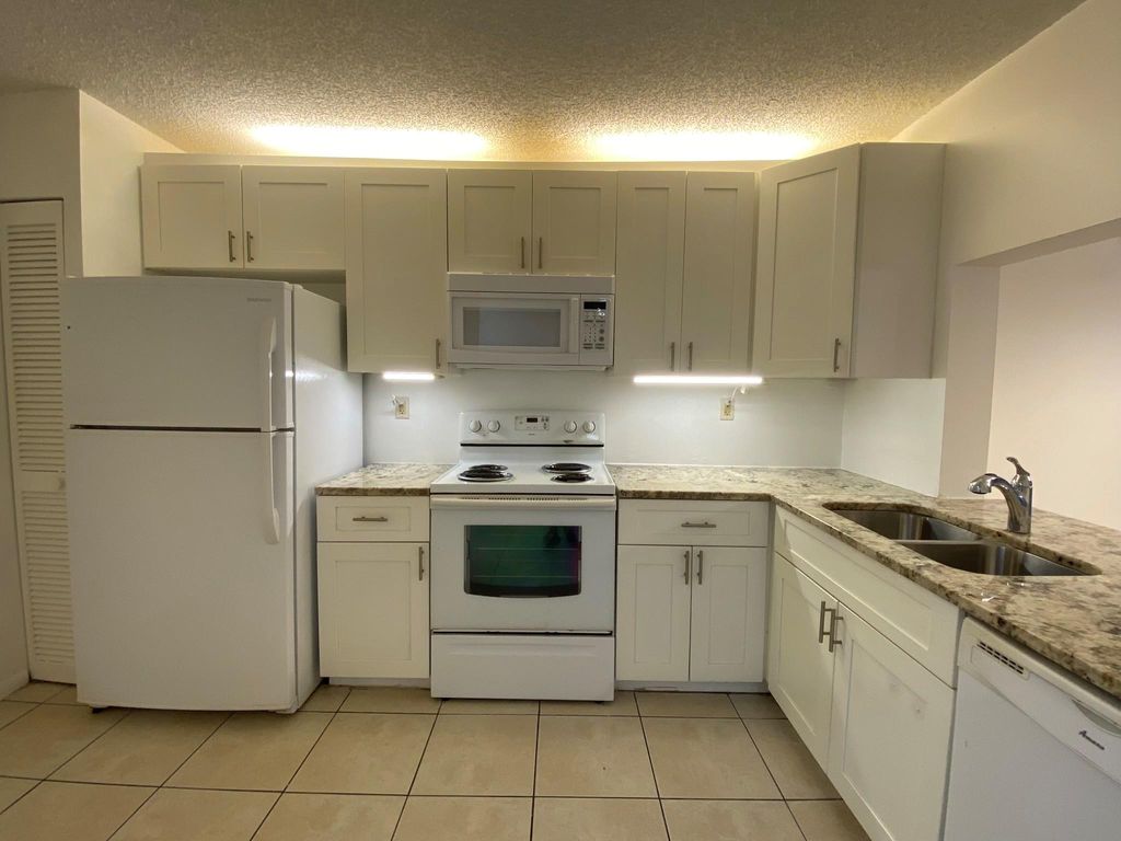Photo of 9000 NW 28th Drive #1-206, Coral Springs, FL 33065 (MLS # F10429418)