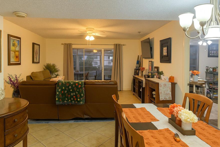 Motivated Seller! This beautifully updated 2-bedroom, 2-bath condo features newer appliances, including the water heater. One of the few all-ages units nestled within a 55+ community a rare find, this home offers peaceful lakefront living in the heart of Palm Beach County. Move right in and enjoy durable flooring throughout, impact windows for added peace of mind, and a bright, open layout. The tiled, screened-in patio overlooks a serene lake and fountain perfect for morning coffee or unwinding at the end of the day. The home has been well maintained with a newer A/C, recently replaced water heater, and a brand-new roof on the building, offering comfort and easy South Florida living.