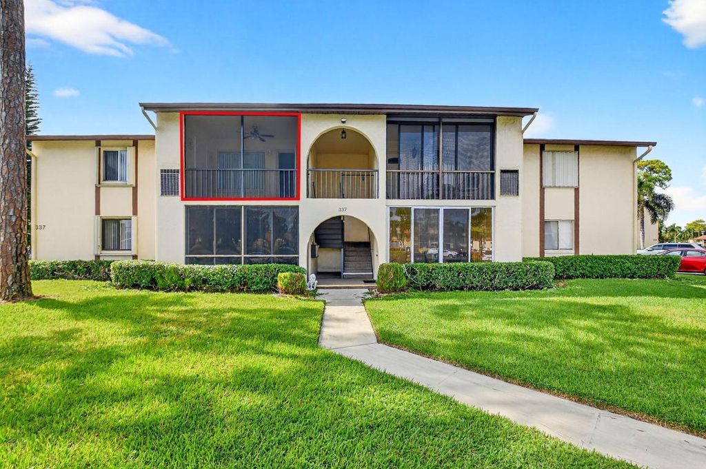 Photo of 337 Knotty Pine Circle #A-2, Greenacres, FL 33463 (MLS # R11136406)