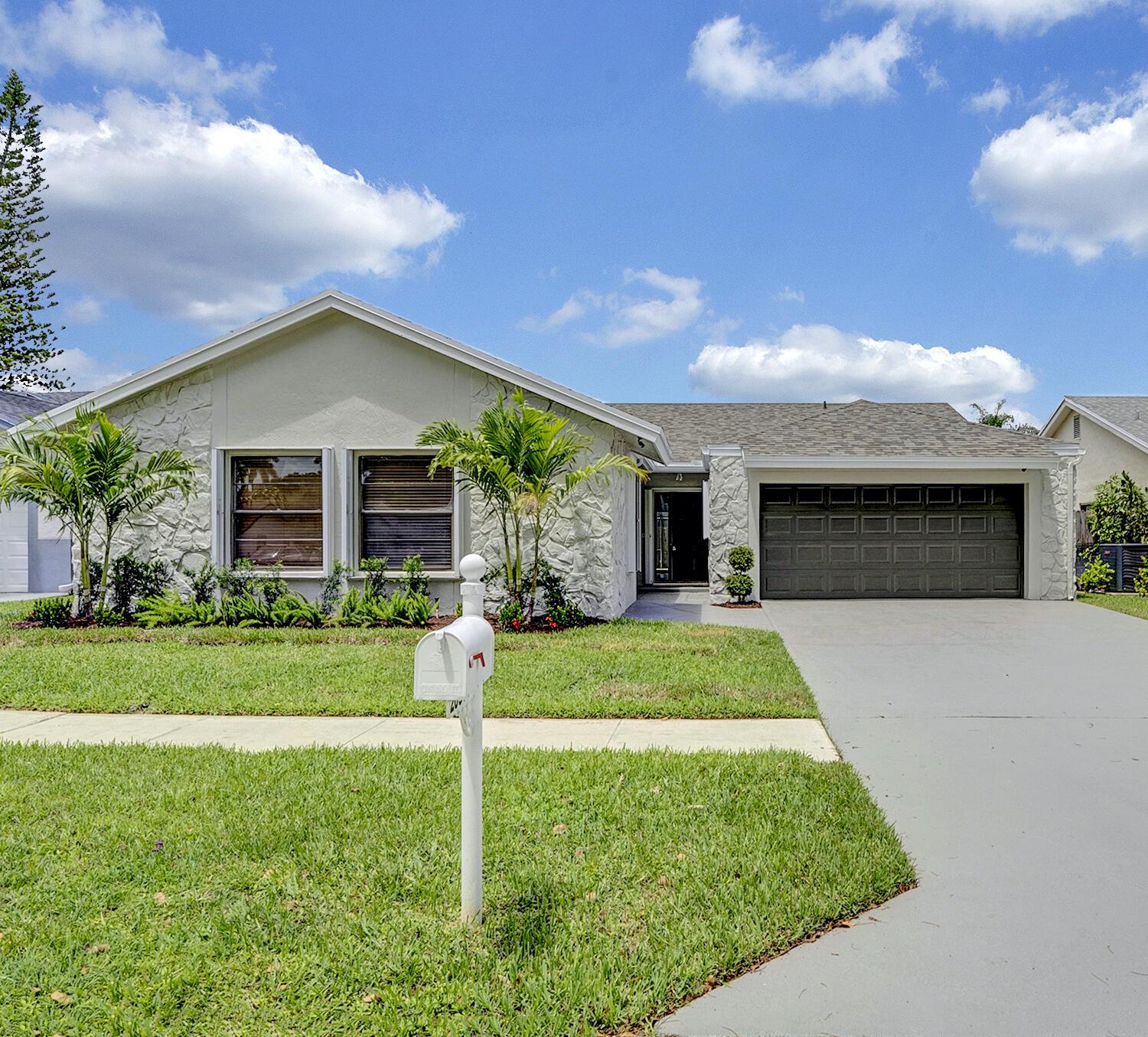 Discover this beautifully renovated 4-bedroom, 2-bathroom single-family home with private pool at 20977 Country Creek Dr, nestled in the highly sought-after Loggers Run - Country Landings III community in West Boca Raton. This stunning home features a private pool with a screened-in lanai. Recently updated throughout, the property boasts fresh interior and exterior paint, new tropical landscaping, a brand new roof, all new appliances, modern new floors, remodeled bathrooms, renovated kitchen, stylish new light fixtures, hurricane window & slider doors, and completely updated electrical. A rated school district: Sandpiper Shores Elementary, Loggers Run Middle School, & West Boca High. This home is also within walking distance to the community park, playground, tennis & basketball courts.