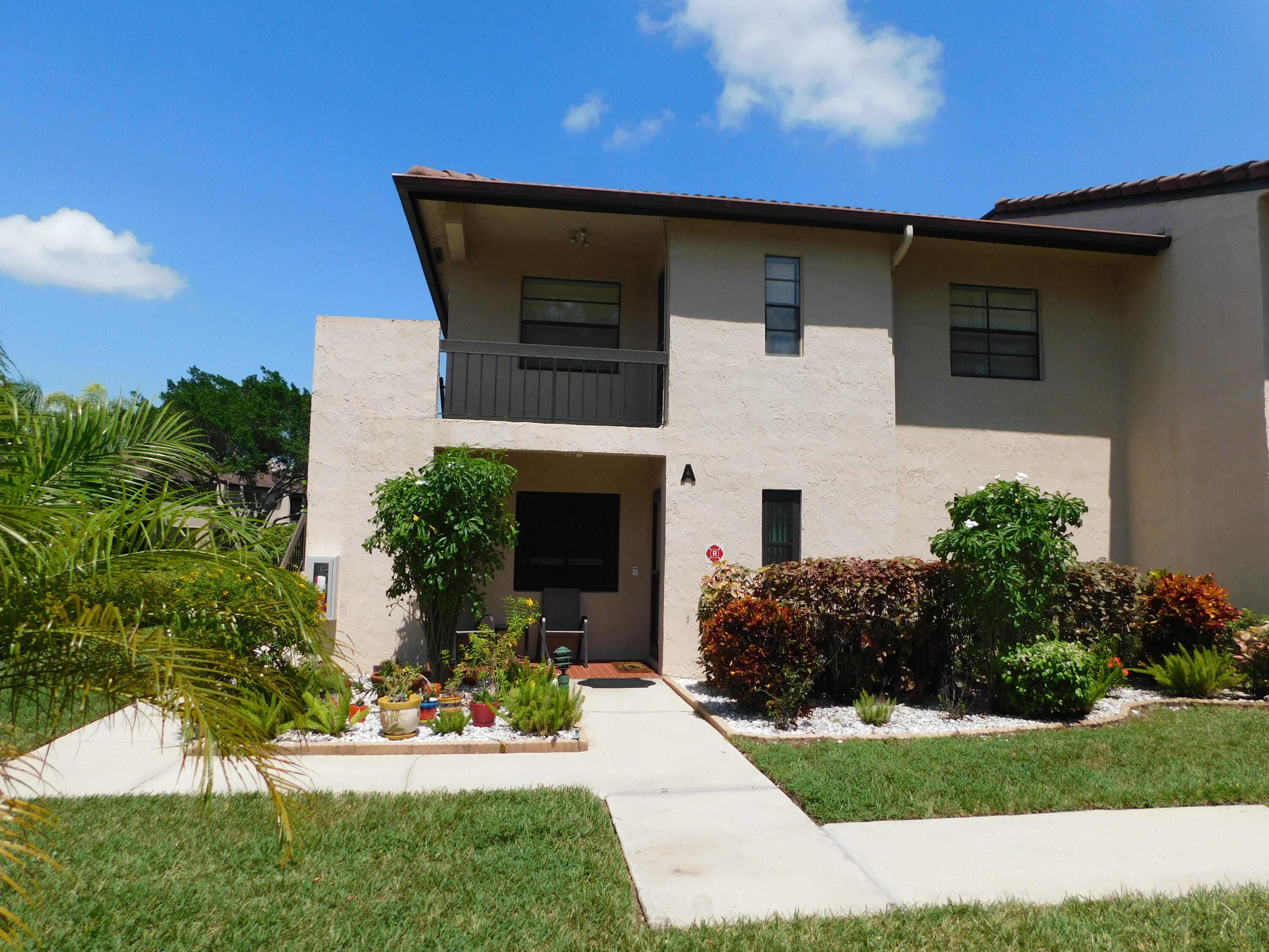 Clean & furnished first floor unit with magnificent views. Corner unit offers a lot of natural light w/ enclosed back offering serenity of greenery & lake view. Stackable clothes washer & dryer in unit & close assigned parking spot (1) offers convenience. Both walk-in shower & shower/tub in home. Ample, close parking for guests. Subdivision is gated w/ community pool. Desirable Boca Raton location convenient to shopping, I-95, Florida Turnpike, restaurants, Town Center Mall & main roads. Community is age-restricted to 55+. No pets & No smoking. Annual lease only.