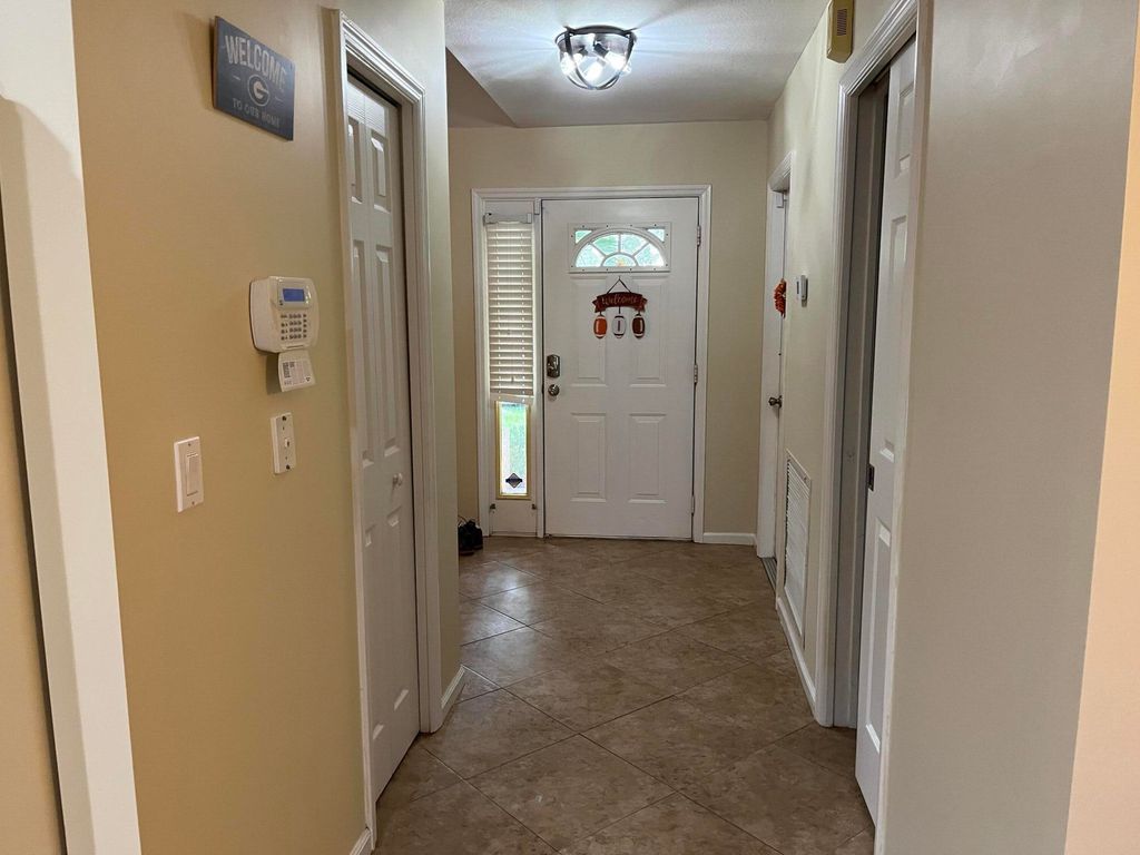Photo of 6769 NW Abigail Avenue, Port Saint Lucie, FL 34983 (MLS # R11038952)