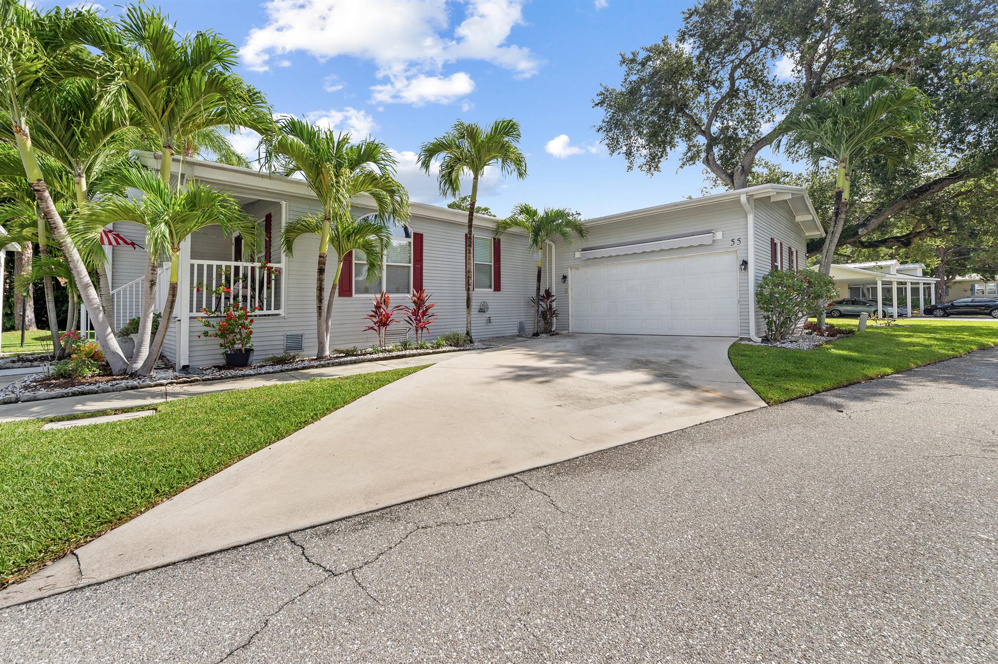 Located in the desirable Meadows community at the heart of Palm Beach Gardens, this outstanding property offers a spacious garage and an open-concept floor plan. The residence features three bedrooms and two full bathrooms, with a kitchen thoughtfully designed for entertainment. Recent improvements to this property include a new roof installed in 2021 with warranty coverage, an air conditioning unit added to the garage in 2023, and a new home AC system installed in 2019. The primary bathroom features double sinks and a walk-in shower with dual seating. Additional amenities comprise an interior laundry room and a full suite of appliances, including a dishwasher (2019), microwave (2019), refrigerator (2020), dryer (2019), hot water heater (2021), and garbage disposal (2019).