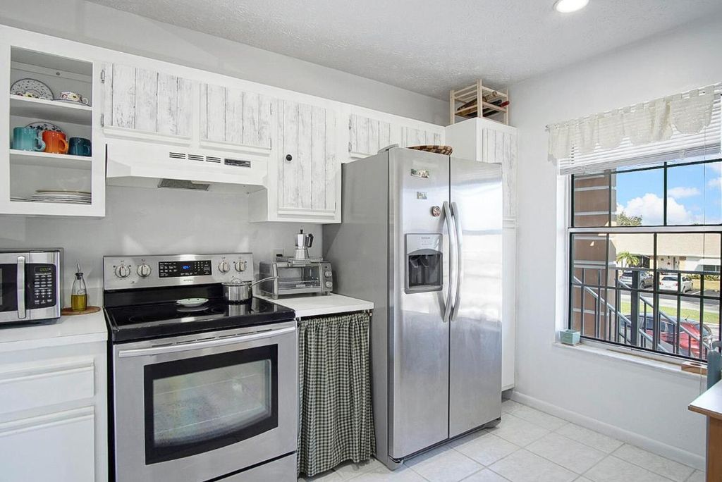 Photo of 1203 S Lakes End Drive #E-2, Fort Pierce, FL 34982 (MLS # R11150172)