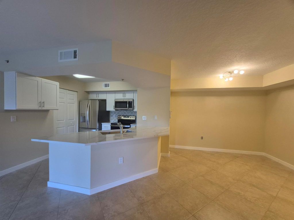 Photo of 3608 NW Adriatic Lane #6-108, Jensen Beach, FL 34957 (MLS # R11072666)