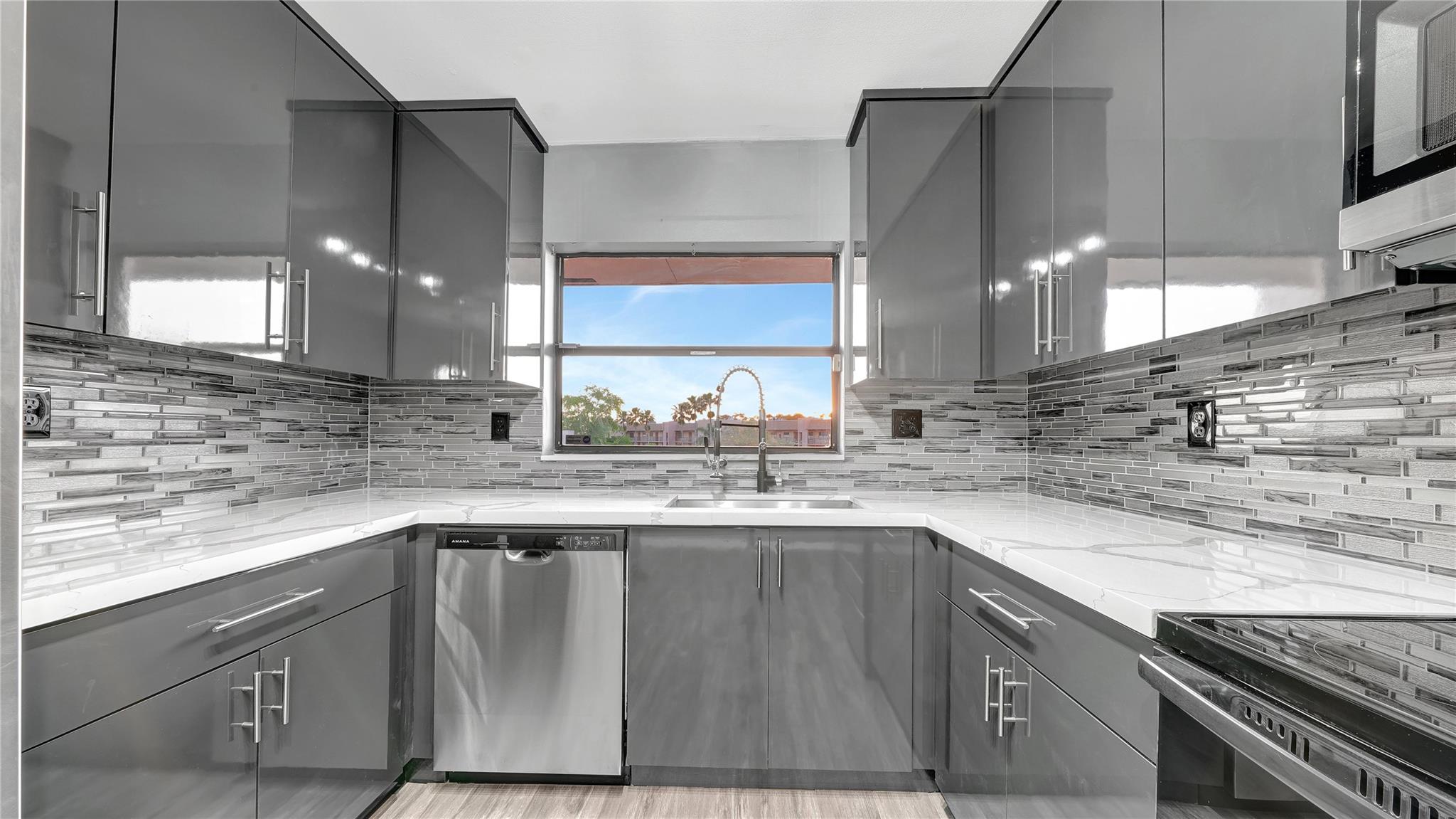 Look No Further! This fully renovated unit located on the 4th floor of Phase 4 is the perfect home for you! Features include brand new kitchen with brand-new stainless-steel appliances, brand new quartz calacatta classic countertops, both bathrooms fully renovated, all new floors throughout, beautiful view of the water and golf course, screened in patio, amazing amenities. Close to restaurants, shopping, major highways, etc.