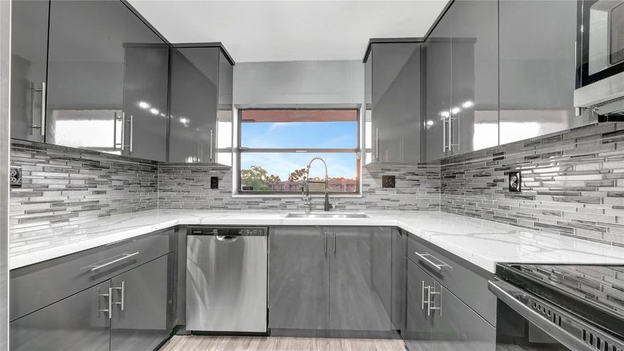 Price Just Reduced! Look No Further! This fully renovated unit located on the 4th floor of Phase 4 is the perfect home for you! Features include brand new kitchen with brand-new stainless-steel appliances, brand new quartz calacatta classic countertops, both bathrooms fully renovated, all new floors throughout, beautiful view of the water and golf course, screened in patio, amazing amenities. Close to restaurants, shopping, major highways, etc.