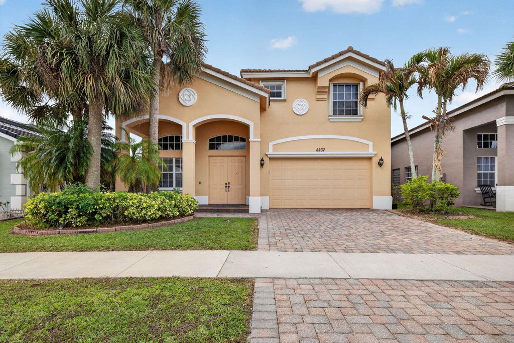 Photo of 2237 SW Newport Isles Boulevard, Port Saint Lucie, FL 34953 (MLS # B26019828)