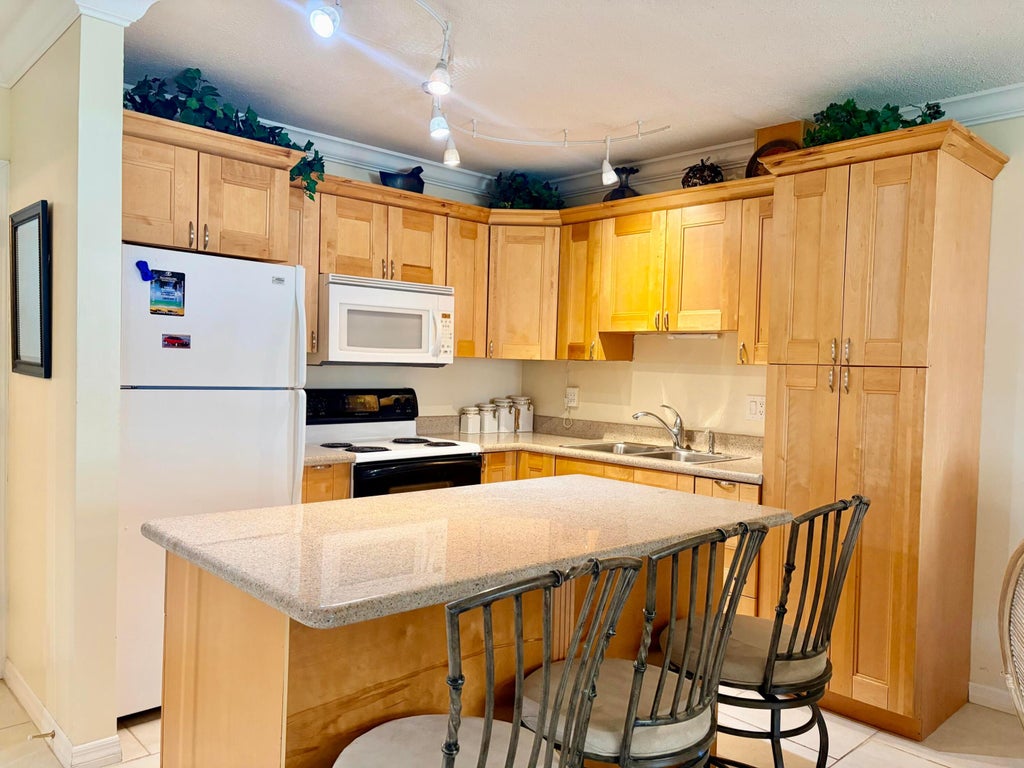 Photo of 1560 Mckinley Street #115w, Hollywood, FL 33020 (MLS # B26024823)