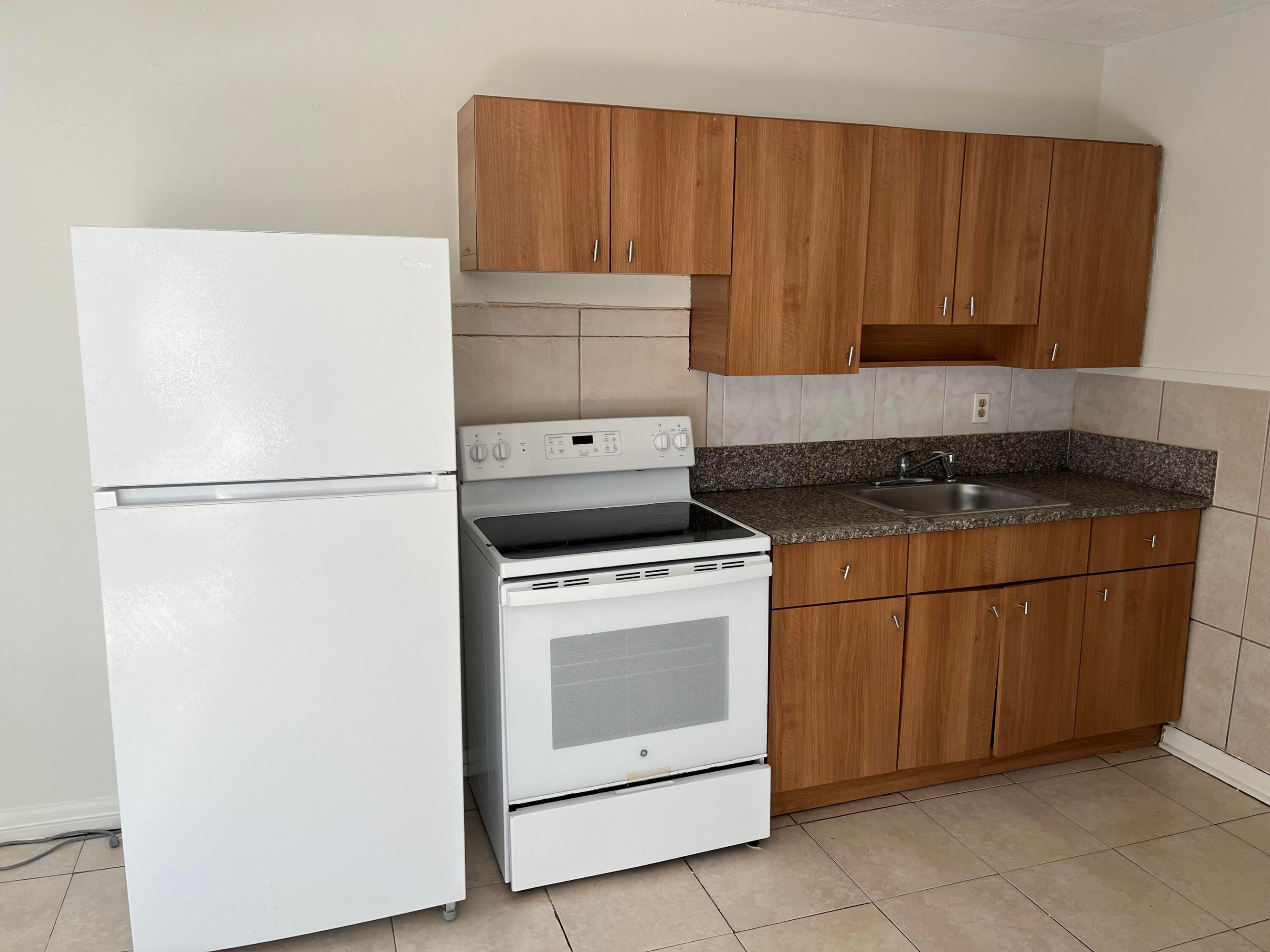 S/D OF 21-44-43, W 1/2 IN - Residential Income