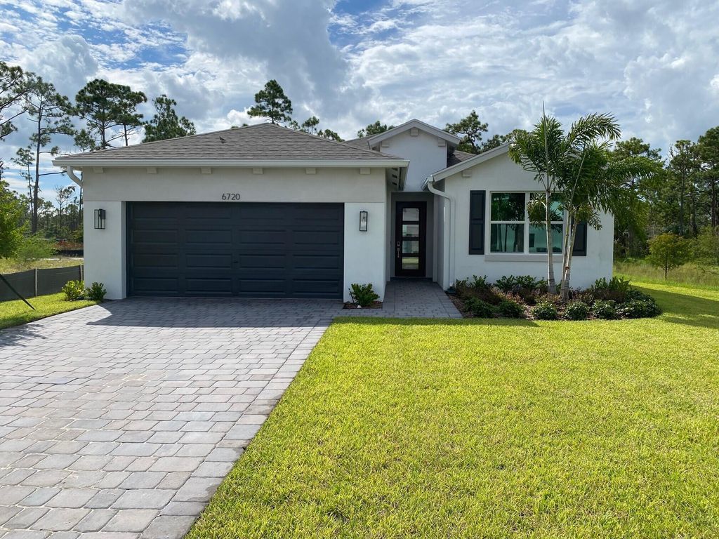 Photo of 6720 SE Park Trace Drive, Stuart, FL 34997 (MLS # R11014915)