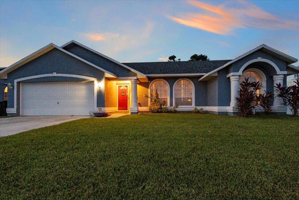 Photo of 1371 SE Appamattox Terrace, Port Saint Lucie, FL 34952 (MLS # R10930908)