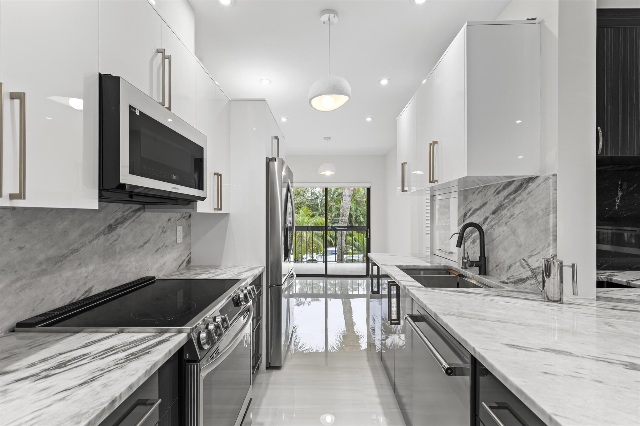 This Stunning condo was designed for the owner and no expense was spared. Full Wet bar, waterfall marble counters and GIANT master bath, with His and Hers Closets. All custom glass and privacy toilet rooms. Impact Glass, double balconies everything new including the doors, custom built closets, porcelain tile and top of the line appliances. Golf cart over to the show grounds and enjoy access to the gym , restaurant or tennis center across the street. Enjoy polo clubs relaxing ambiance and walking paths. This is a community you will truly enjoy. For sale RX-11112305, TXT Owner/listing agent for showing. Nicole Liebowitz