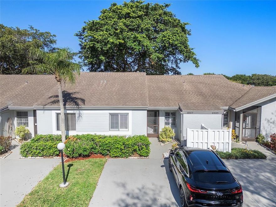 THIS STUNNING, LIGHT & BRIGHT LAKEFRONT VILLA IS TURN-KEY AND CAN BE PURCHASED FULLY FURNISHED! THE INTERIOR HAS BEEN THOUGHTFULLY RENOVATED WITH A BEAUTIFUL OPEN KITHEN AND BREAKFAST BAR, SOLID FLOORING THRU-OUT, UPDATED BATHROOMS, PLANTATION SHUTTERS, LOTS OF CLOSET AND STORAGE SPACE, AND A LARGE COVERED SCREENED PATIO TO ENJOY THE SPECTACULAR LAKE VIEWS. NO WORRYING ABOUT AN AGING ROOF,  BUYER TO BENEFIT FROM A BRAND NEW ROOF, BEING PAID FOR BY SELLER.  ALL OF THIS IN A PARK-LIKE 55+ COMMUNITY, COMPLETE WITH GATED ENTRANCES, TENNIS, PICKLEBALL, SWIMMING POOL, FITNESS ROOM, AND PLENTY OF WALKING TRAILS.