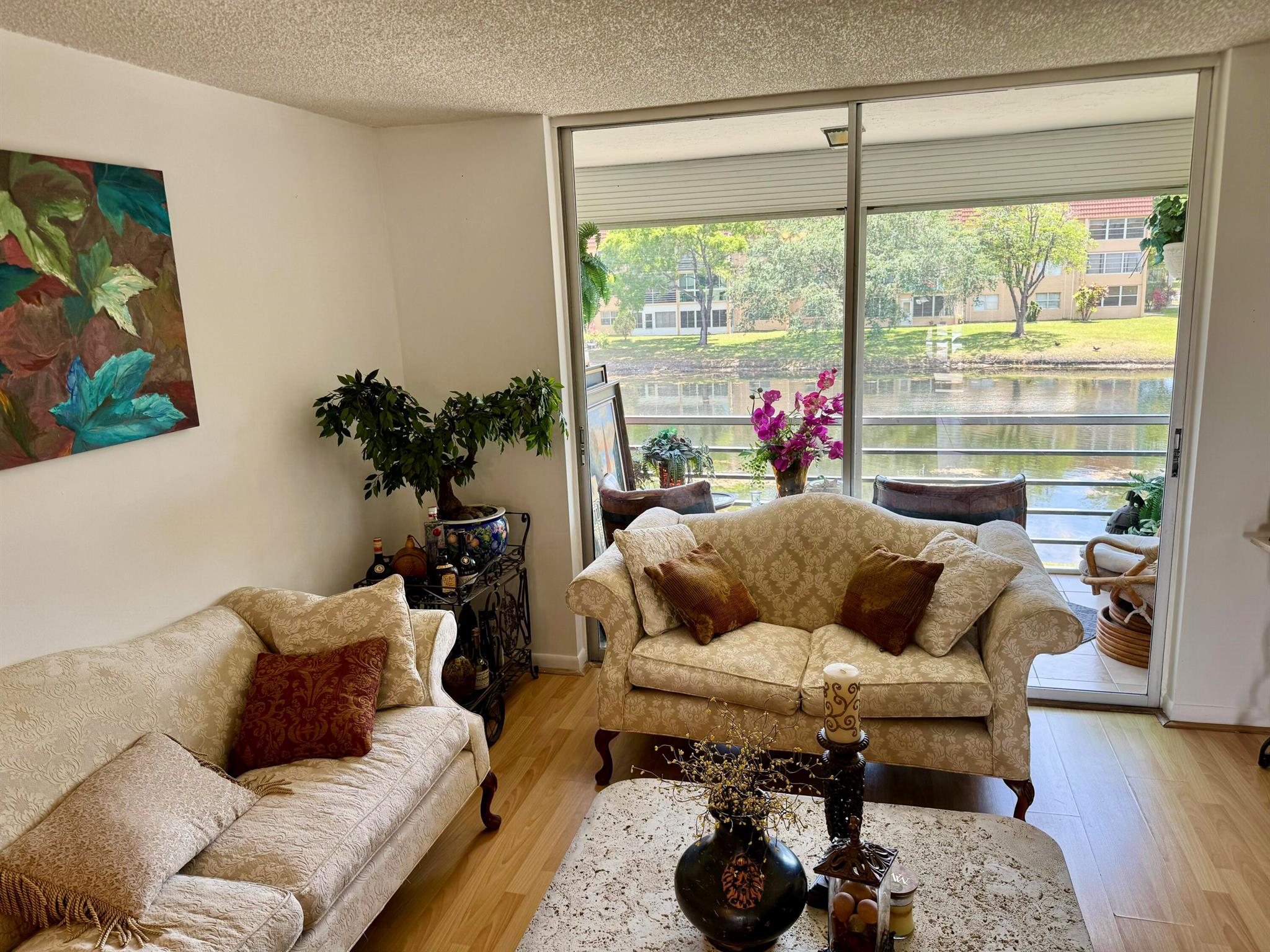 55+!!Fantastic opportunity to own this fully furnished light and bright unit with breathtaking water views!Remodeled bathrooms and SS appliances and freshly painted!!Brand new AC and water heater! Well maintained community ofers golf without any extra fees or memberships.Enjoy theater shows, indoor & outdoor pools, BBQ area, fitness center, pickleball, tennis, AŚ, library, courtesy bus, banquet room, billiards, weekly and monthly events, activities, and workshops. Internet, water and cable included in monthly fees.Conveniently located Minutes from Fort Lauderdale Airport to the east, Sawgrass mall and the Panthers Arena to the west