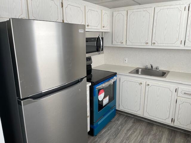 BEST VILLAGE LOCATION IN BRIGHTON SECTION. 1ST FLOOR, CORNER UNIT WITH PARKING VERY CLOSE. NEWLY PAINTED, NEW STAINLESS APPLIANCES, NEW LAMINATE FLOORS THROUGHOUT. STORM SHUTTERS ON THE PATIO. BEAUTIFUL GARDEN VIEW. MOVE IN CONDITION.