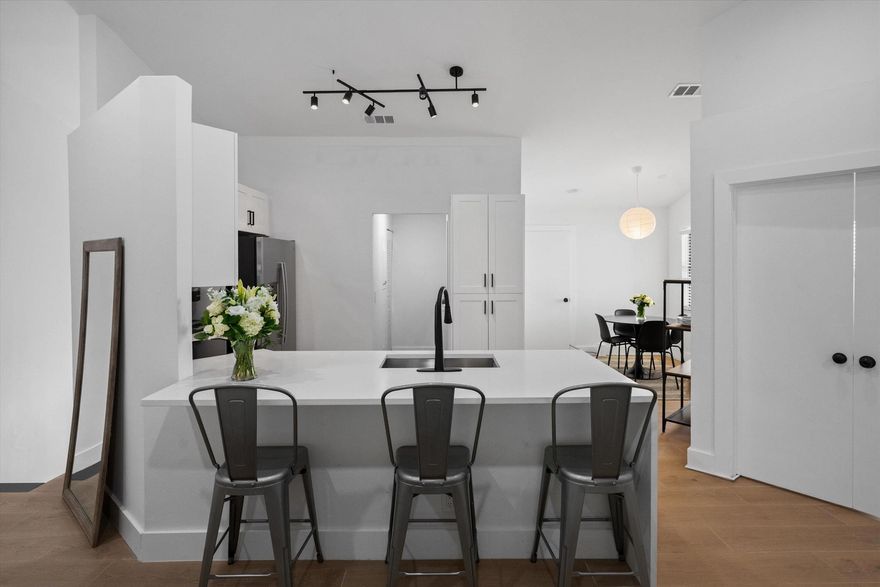 Located in the heart of Wellington just minutes from top equestrian venues and dining, this beautifully updated 3-bedroom, 2-bath condo offers a fresh, modern feel throughout. The bright open layout features vaulted ceilings and refined finishes, with a kitchen showcasing quartz countertops, modern cabinetry, and a large pantry. Both bathrooms feature custom tile and contemporary fixtures. Enjoy a spacious screened patio, private one-car garage with direct access, and community amenities including a pool, fitness center, and tennis. A fully renovated, move-in-ready condo offering comfort and style in a prime Wellington location.