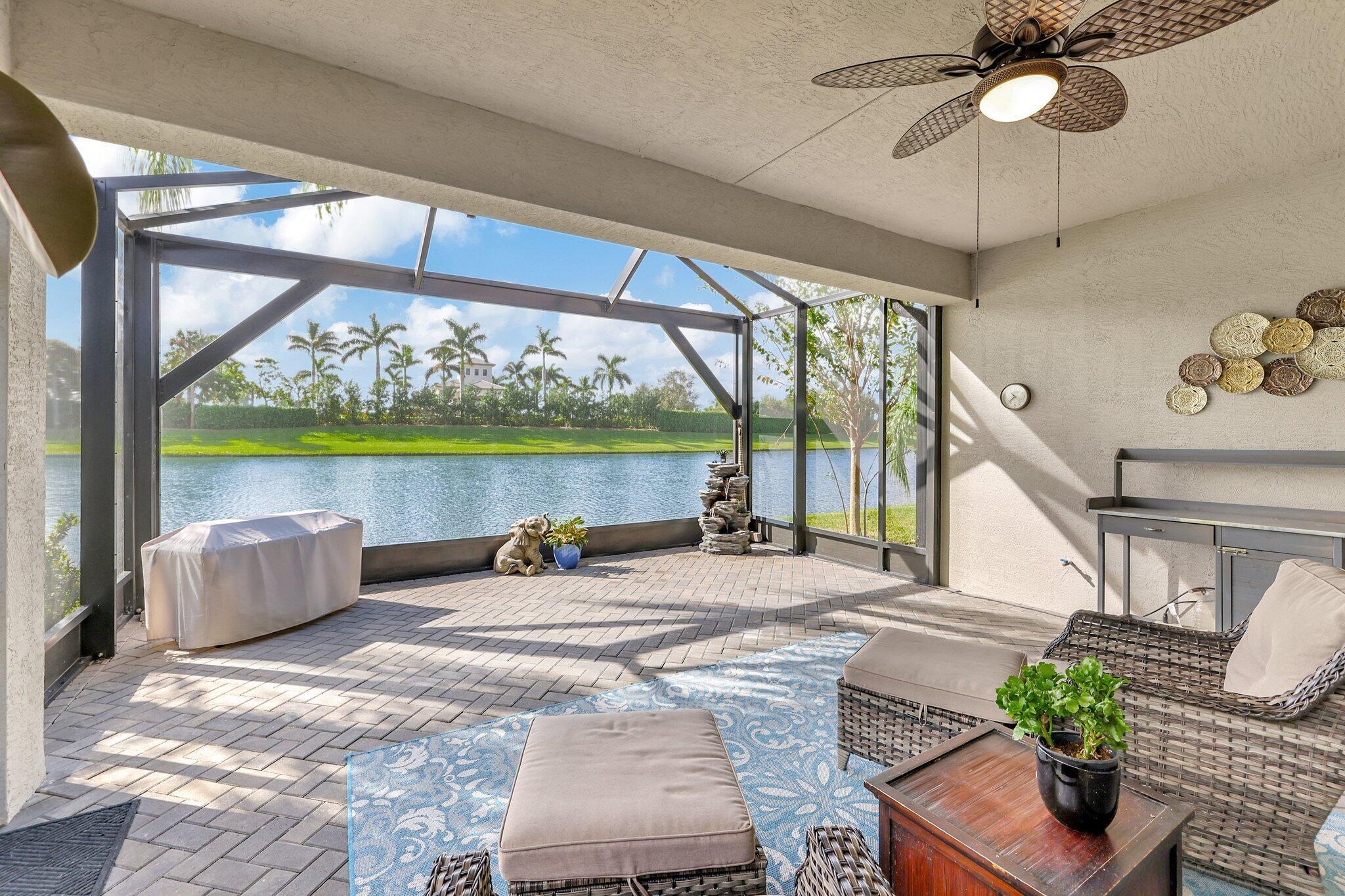 Enjoy the magnificent lakefront views in this Tribeca model home located in Valencia Cay at Riverland. This highly sought after floor plan offers 3 bedrooms, 2.1 baths, PLUS a flex room. This home features an open floor plan, volume ceilings along with a separate dining room and great room area that opens up to the open concept kitchen. The spacious primary suite has stunning views of the water along with 2 walk-in closets, dual vanities and walk-in shower with decorative tile. Entertain your guests on the expanded screened patio. This home is in an unbeatable location with a truly irreplaceable lot.Residents enjoy a 34,000sqft club house with a resort style pool, arts and cultural center,Sports Center and more.