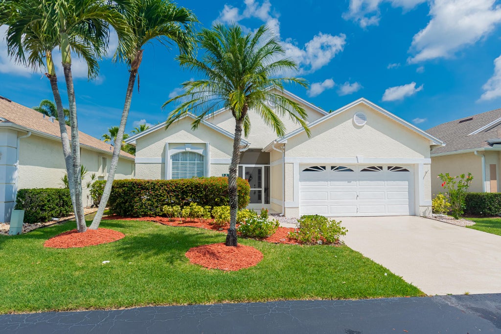 Photo of 590 NW Cortina Lane, Port Saint Lucie, FL 34986 (MLS # R11094026)