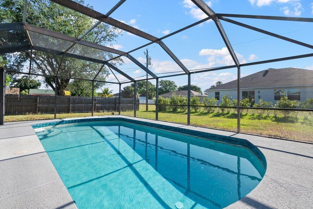 Photo of 2443 SE Marseille Street, Port Saint Lucie, FL 34952 (MLS # R10981820)