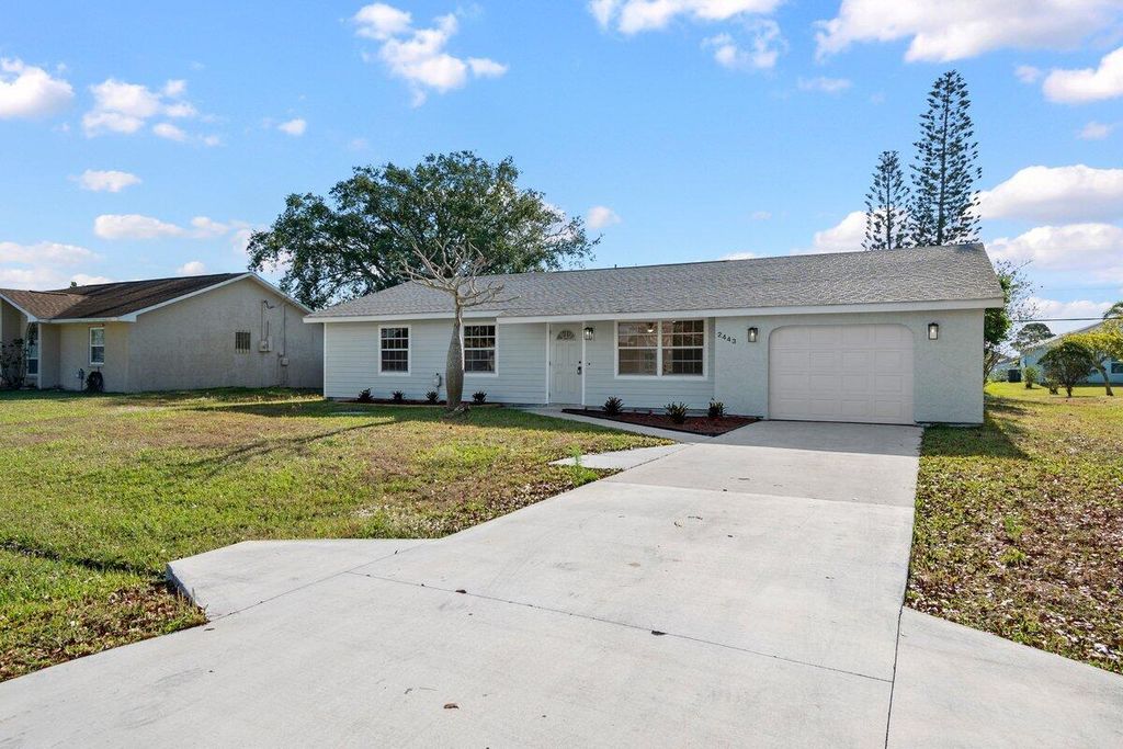 Photo of 2443 SE Marseille Street, Port Saint Lucie, FL 34952 (MLS # R10981820)