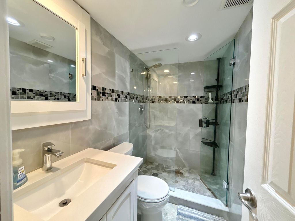 Photo of 223 Pine Hov Circle #C-2, Greenacres, FL 33463 (MLS # B26018806)