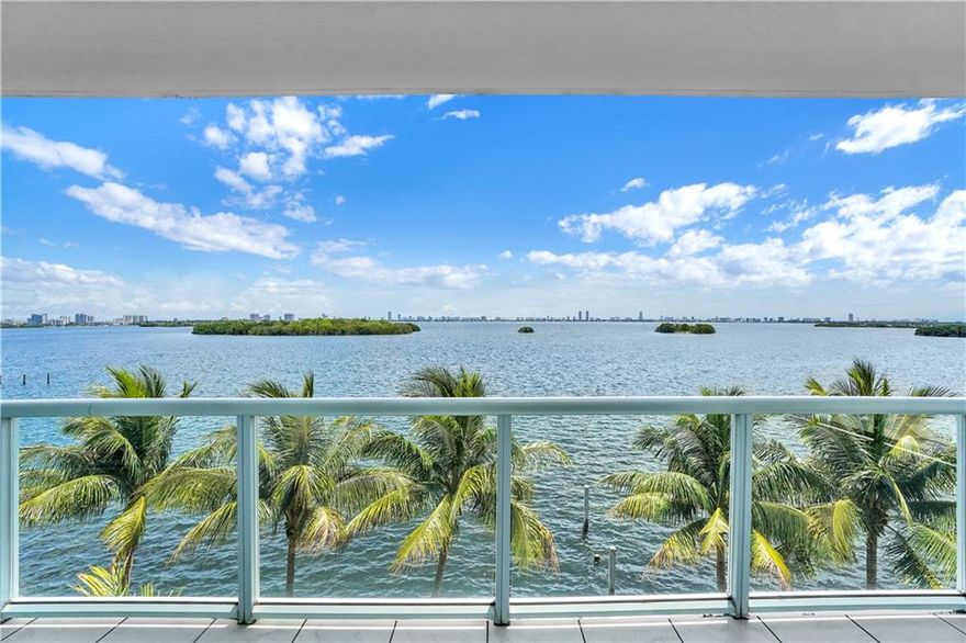Welcome to Morning Side Miami! This secret oasis will take your breath away with expansive views of Biscayne Bay. 2 bed 2.5 bath, light and bright corner unit nestled in the boutique building IOS. Split and open floor plan with a 470+ sq ft wrap around balcony overlooking the pool, and bay. Freshly painted and ready for move-in! Porcelain and wood floors, granite countertops, Miele, Jennair and liebherr appliances. 2 parking spaces. Small fitness center. Large additional storage unit. Pet friendly. Secure and gated parking with excellent onsite management. 15 minutes away from the Miami airport, Wynwood, Midtown, Design District, Miami Beach, Downtown and Brickell area. This is truly a hidden gem you'll want to see!