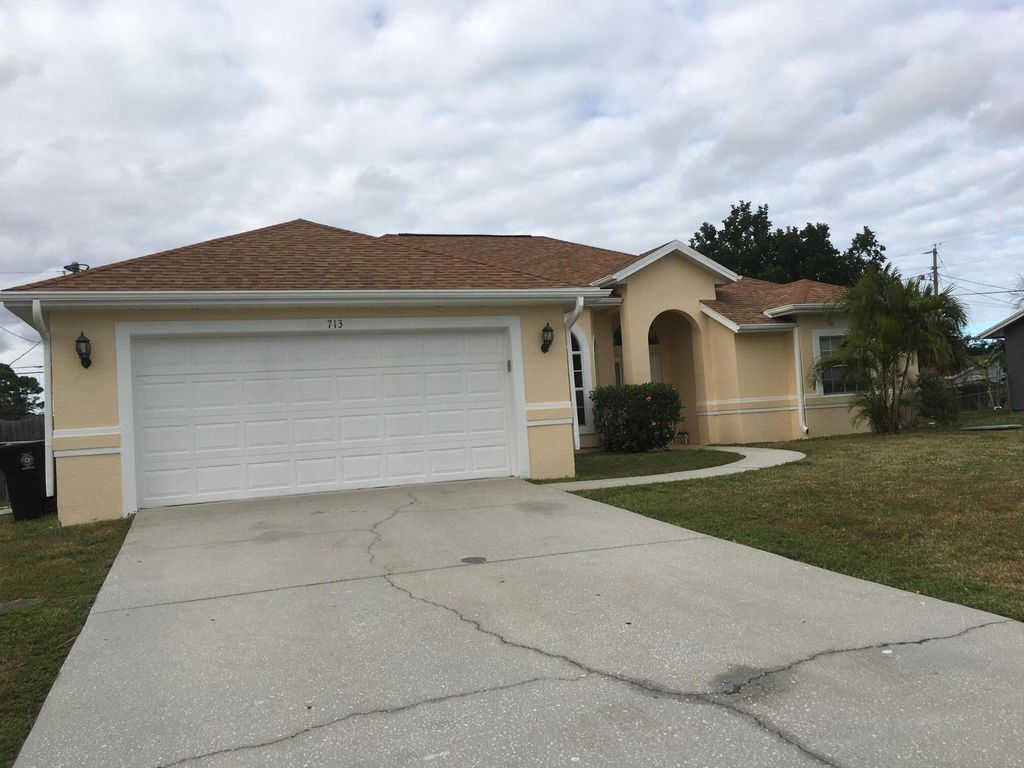 Photo of 713 SW Ancona Road, Port St Lucie, FL 34953 (MLS # R11118464)