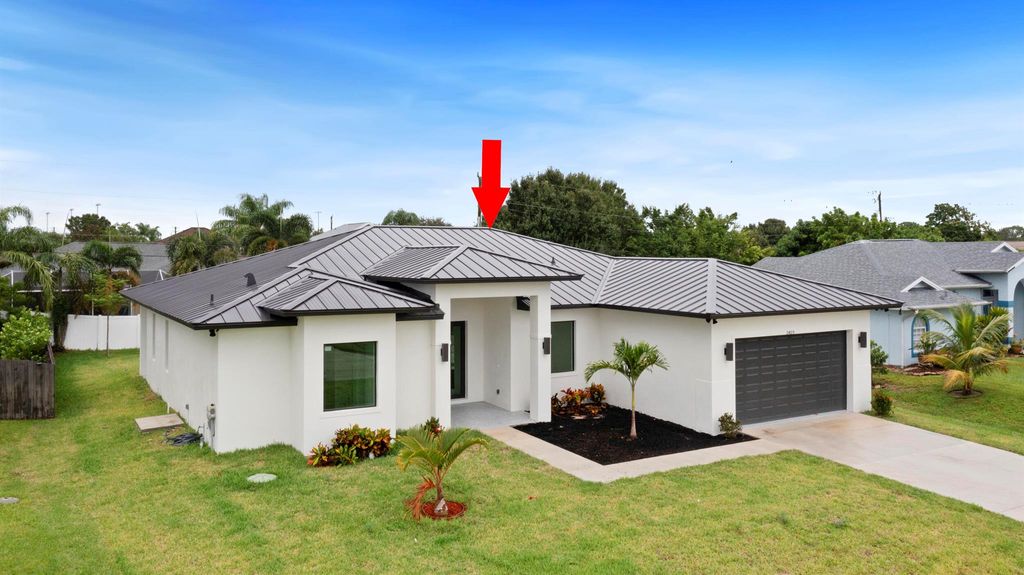 Photo of 3459 SE Hart Circle, Port Saint Lucie, FL 34984 (MLS # R11132263)