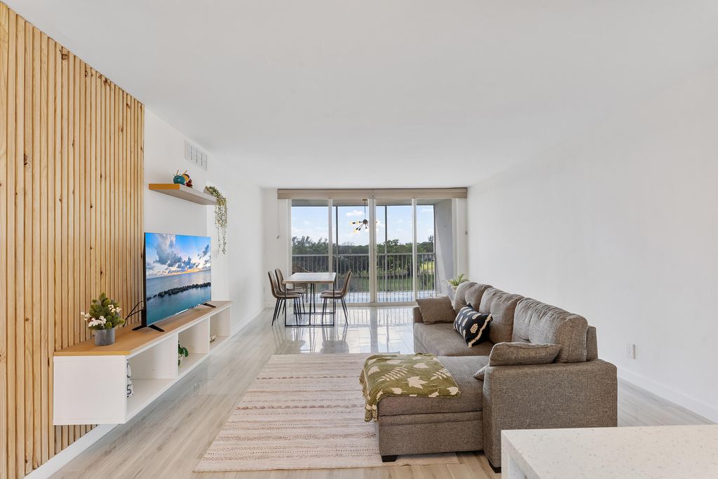 Photo of 3001 S Course Drive #502, Pompano Beach, FL 33069 (MLS # B26001717)