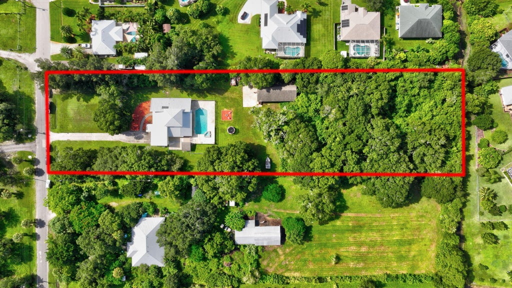 Photo of 5191 NW Dunn Road, Fort Pierce, FL 34981 (MLS # R11010132)