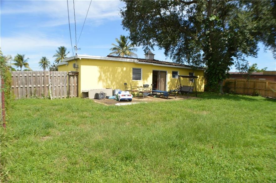 Transform this very well located home to your taste.  Three bedrooms and a spacious living room with space for plenty of entertaiment. Easy access to 826 and one of the best lots in the area.