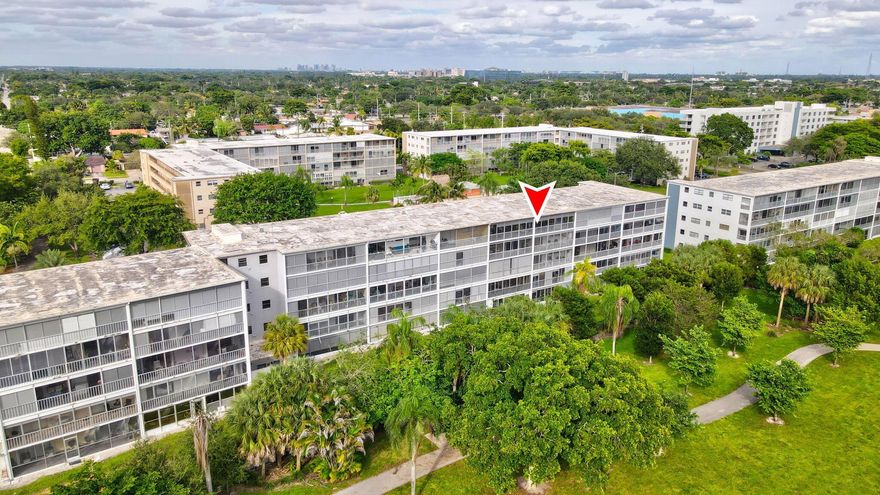 Beautifully combined 2-unit condo designed by engineer/developer featuring 3 bedrooms, 3.5 bathrooms, and over 1,550 sq. ft. of living area. Includes 2 assigned parking spaces.  Updated kitchen with granite countertops, tile backsplash, wood cabinets, and stainless steel appliances. Bright and spacious living/dining area with plenty of natural light throughout.Two primary bedrooms with balcony access.Primary #1: ceiling fan, mini-split A/C, walk-in closet.Primary #2: tile flooring, multiple closets including walk-in, en-suite bath with vanity and shower/tub. Third bedroom features ceiling fan and built-in cabinet. Third bath with white vanity and enclosed shower. Secure lobby entry. Community amenities include 2 pools, BBQ area, gym & tennis court.