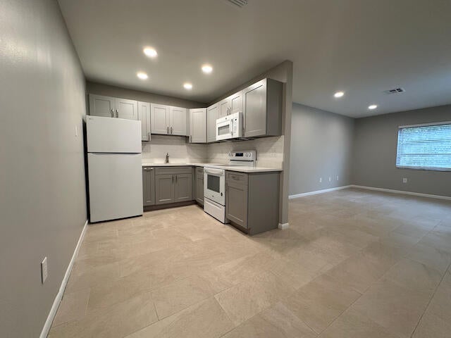 Photo of 1741 N 3rd Ave Avenue N #6, Lake Worth Beach, FL 33460 (MLS # B26011695)
