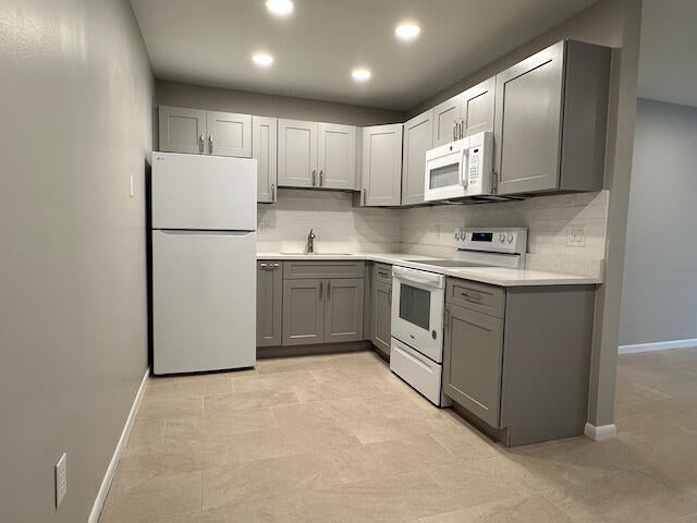 Photo of 1741 N 3rd Ave Avenue N #6, Lake Worth Beach, FL 33460 (MLS # B26011695)
