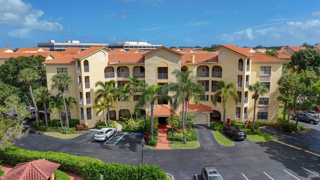 Photo of 300 UNO LAGO Drive #104, Juno Beach, FL 33408 (MLS # B26094020)